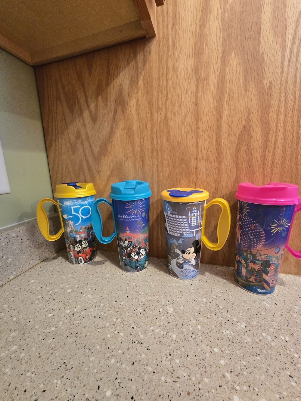 Lot of 4 - Disney 50th Celebration Travel Tumblers - Multicolor Handles